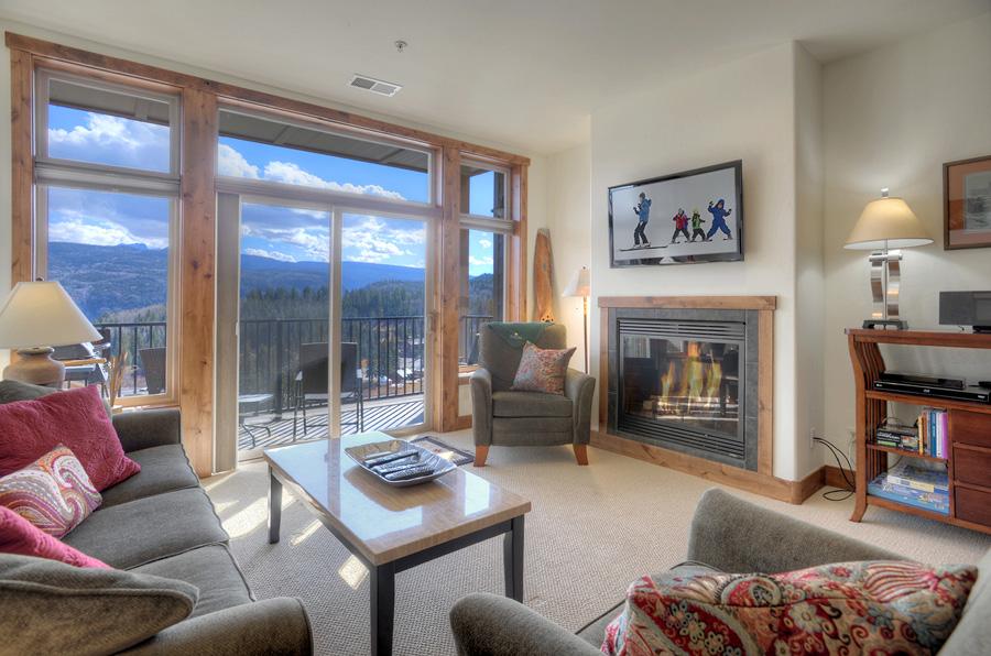 Main Living Space - Gas Fireplace, TV and deck with awesome views