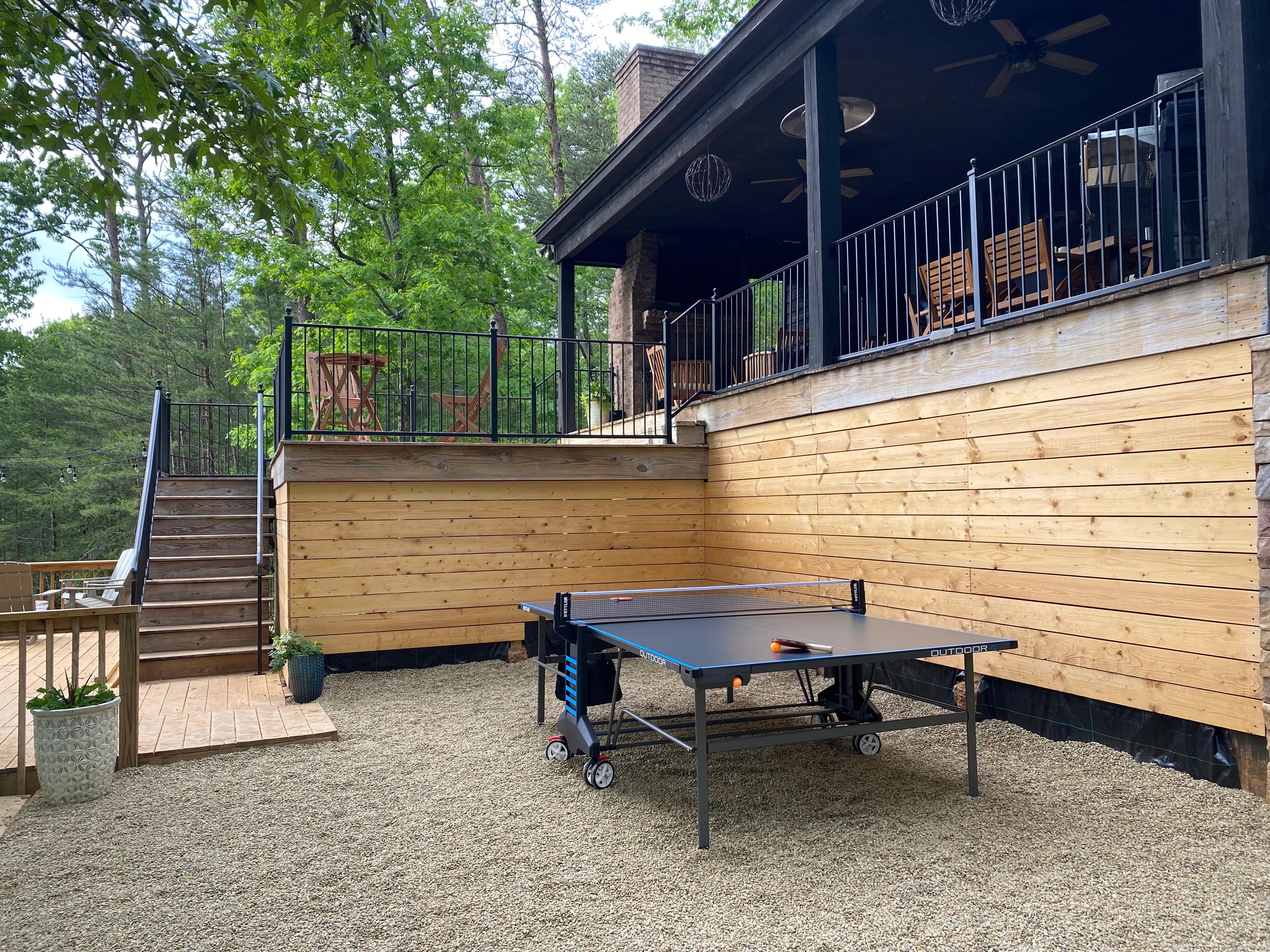 Blue Haven Lake House has a wonderful outdoor space. You can participate in ping pong or enjoy the nice Alabama weather on the plentiful seating!