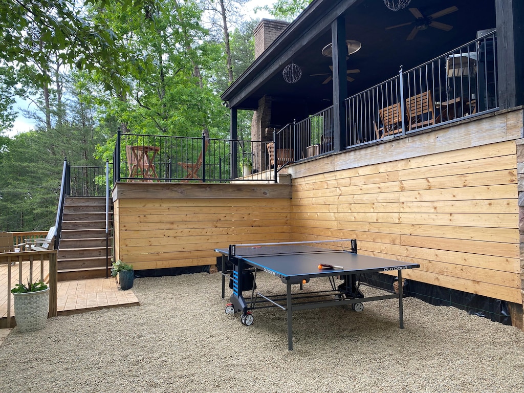 Blue Haven Lake House has a wonderful outdoor space. You can participate in ping pong or enjoy the nice Alabama weather on the plentiful seating!