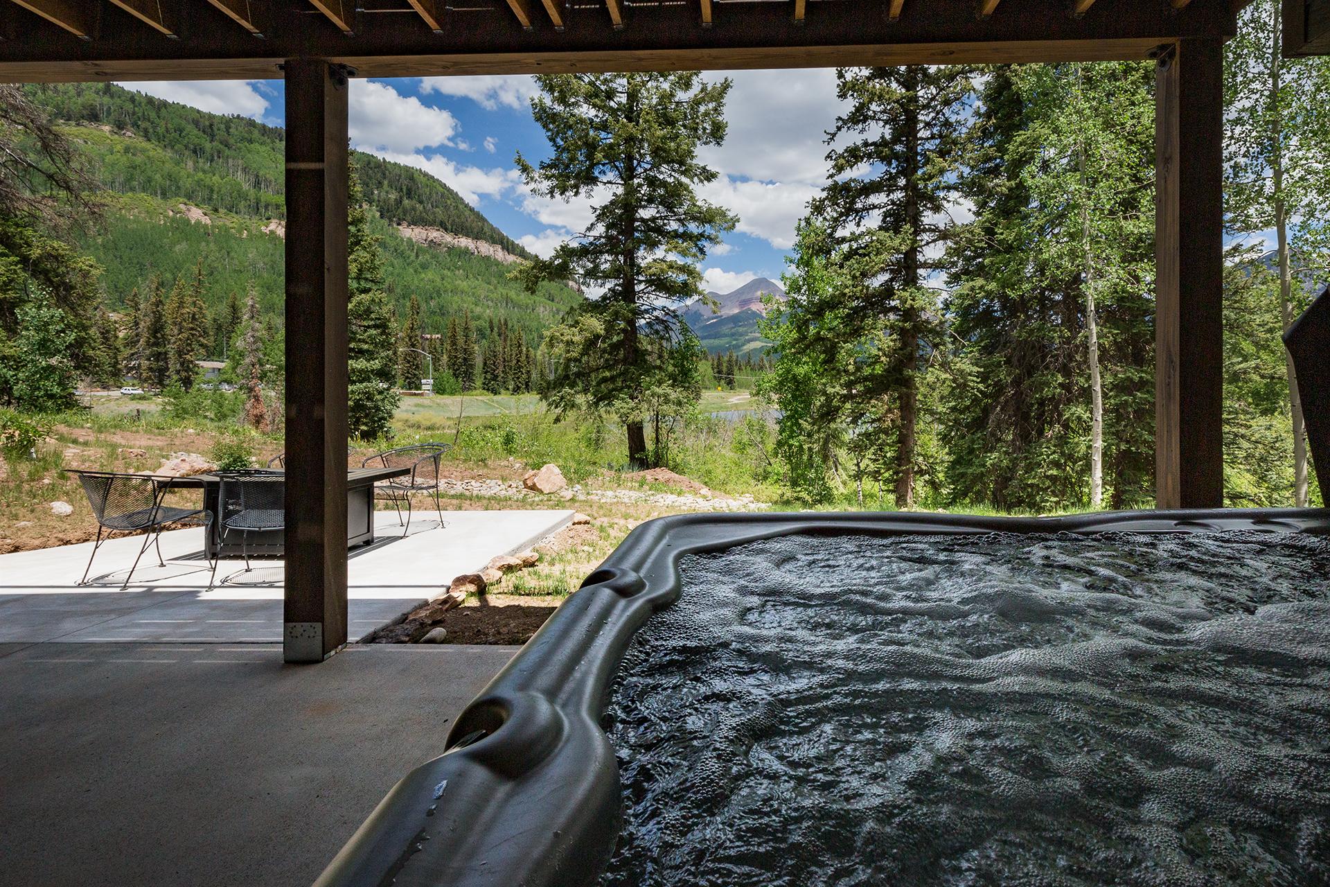 Private hot tub on the patio. Soak in mountain views!

Gas fire pit as well.