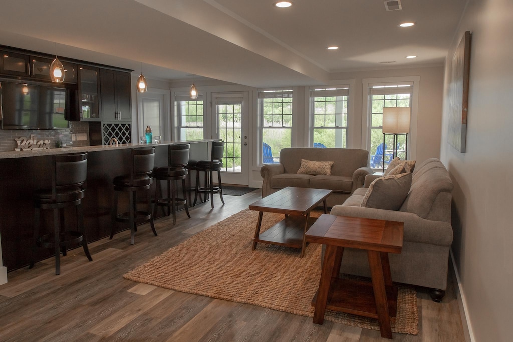 Basement with Fully Stocked Bar and Walk Out to Fire Pit