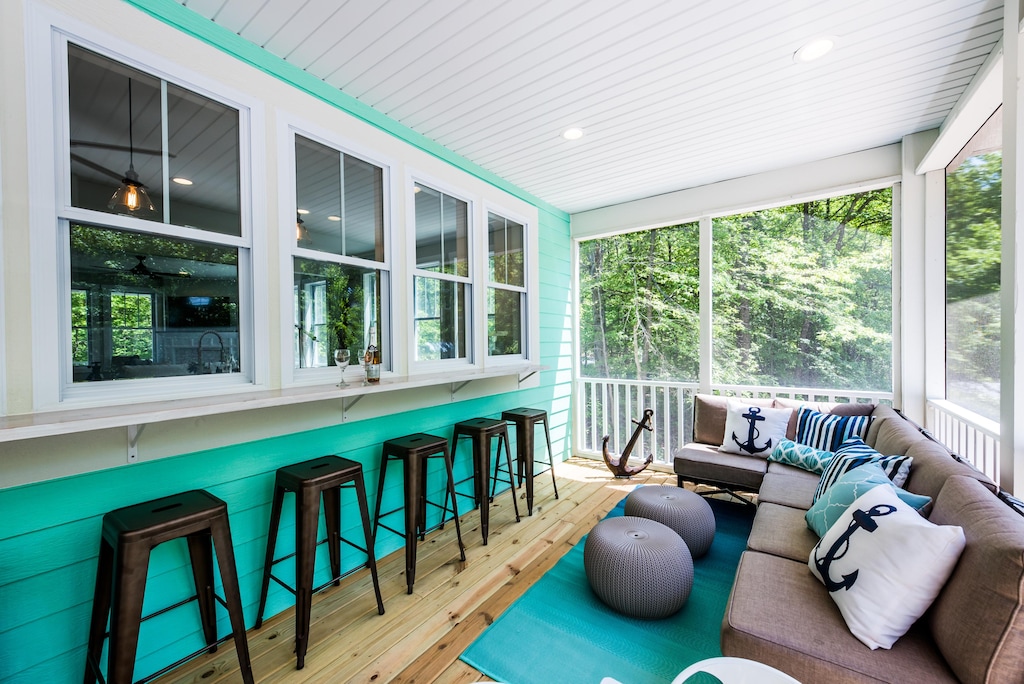 Pull up a seat and enjoy this great gathering space  while the kids place across the street at the Sandcastle Playground