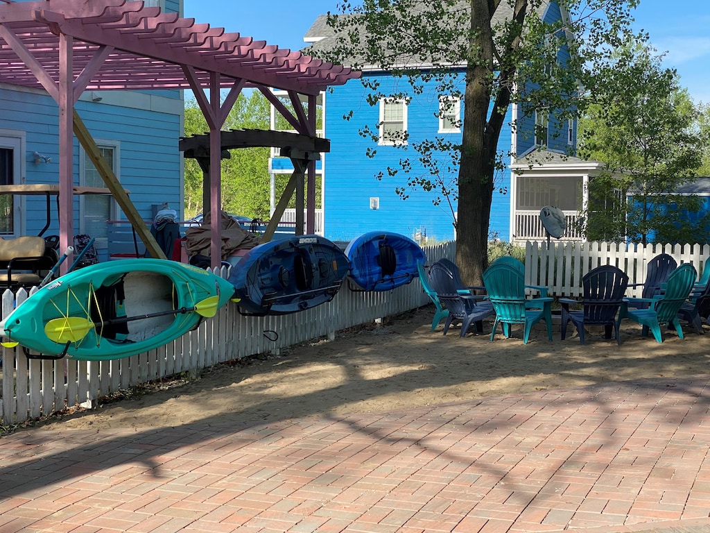 Fire pit, gas grill and kayaks