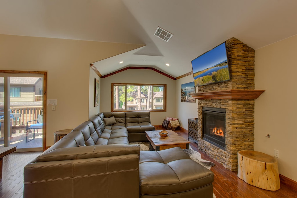 Living area with flat screen tv and fireplace