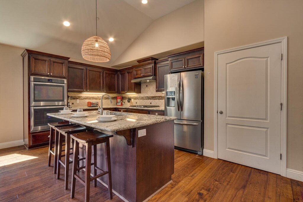 Kitchen area with stainless steel appliances
