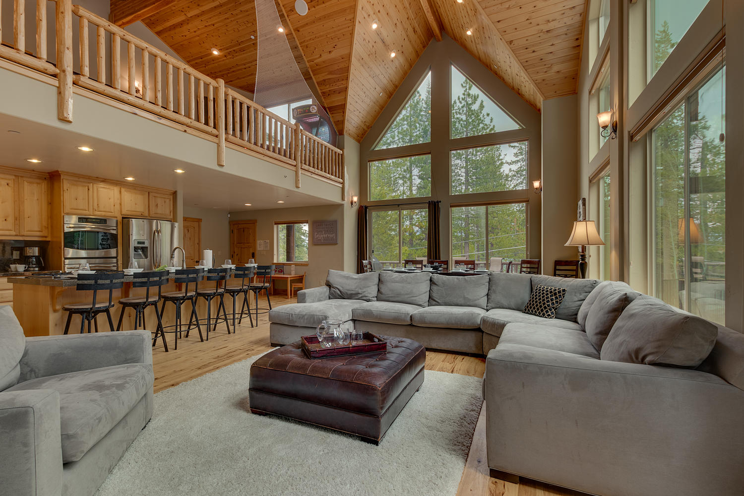 Living area, open kitchen and cathedral ceiling