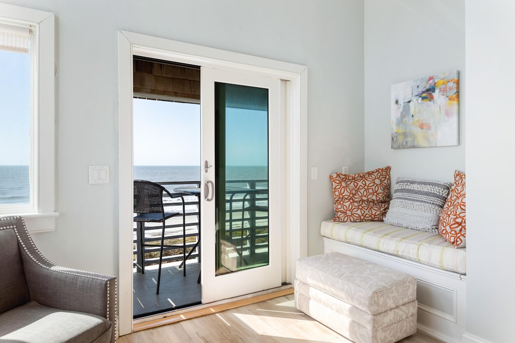 Living area with access to oceanfront deck