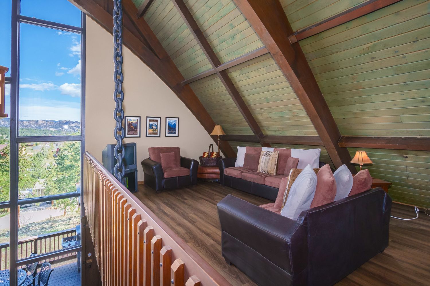 Sky View in the Rockies - Loft with a sitting area with a couch, loveseat and a TV