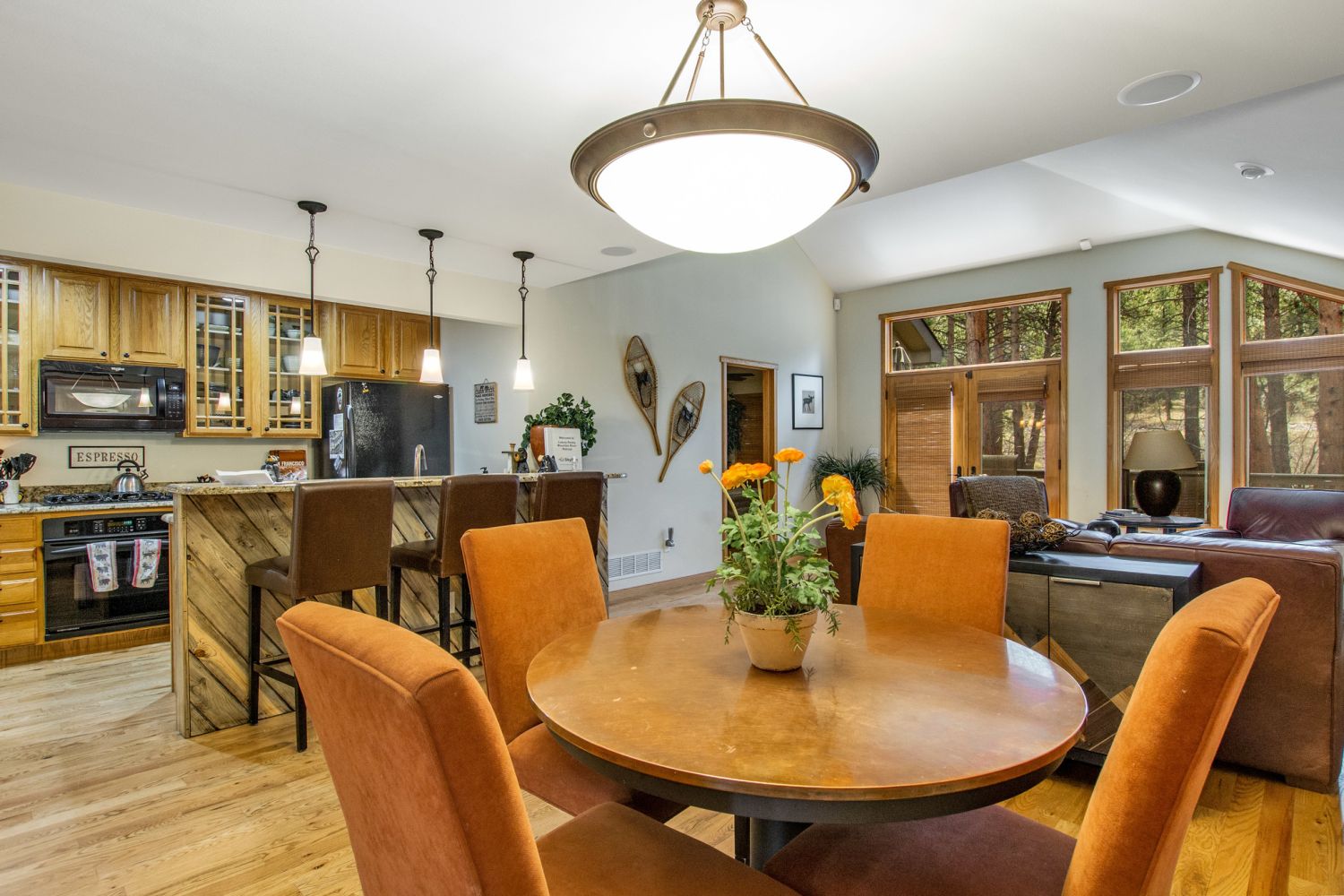 Luxury Rocky Mountain River Retreat - Open living/dining/kitchen floorplan  