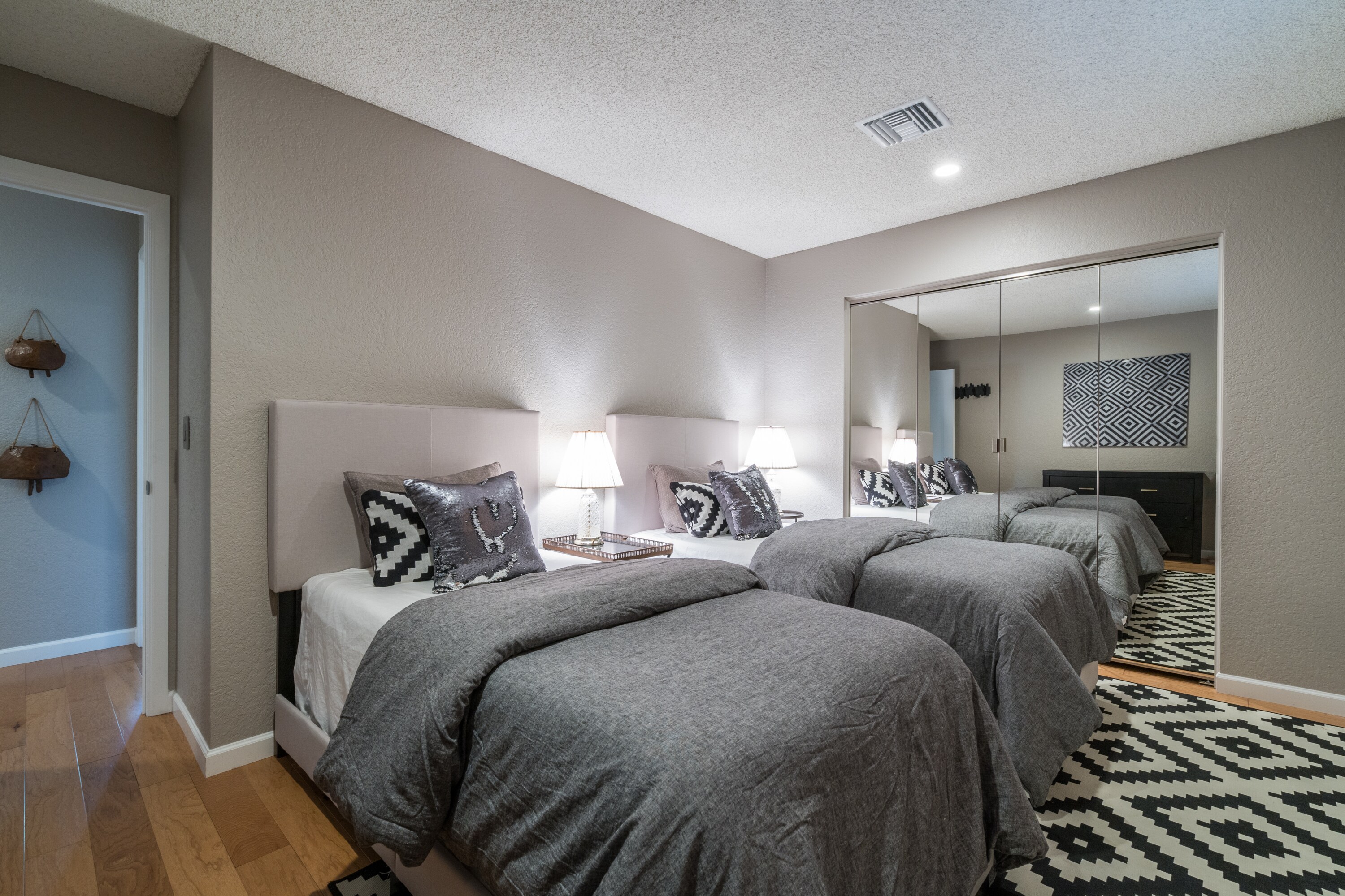 Bedroom 3 with Two Twin Beds and Full Shared Bath Access