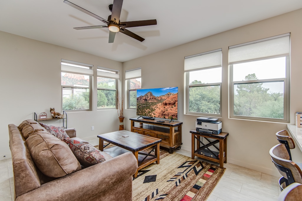 Living Room with a Sleeper Sofa and a 60" Smart TV