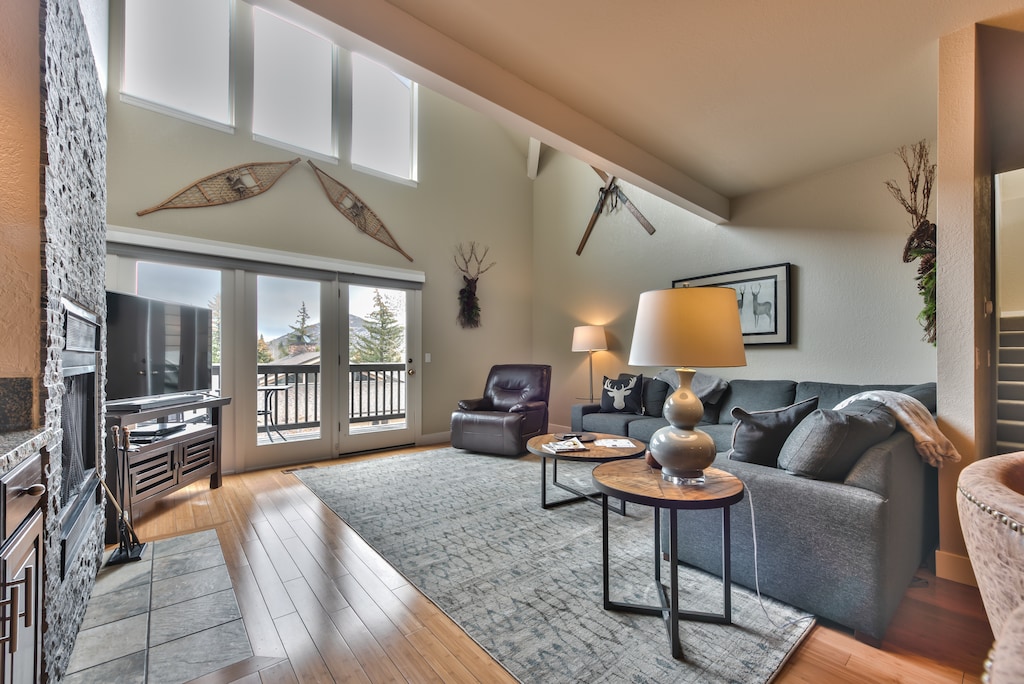 Living room with fireplace, 55" HD Smart TV & DVD, Deck Access