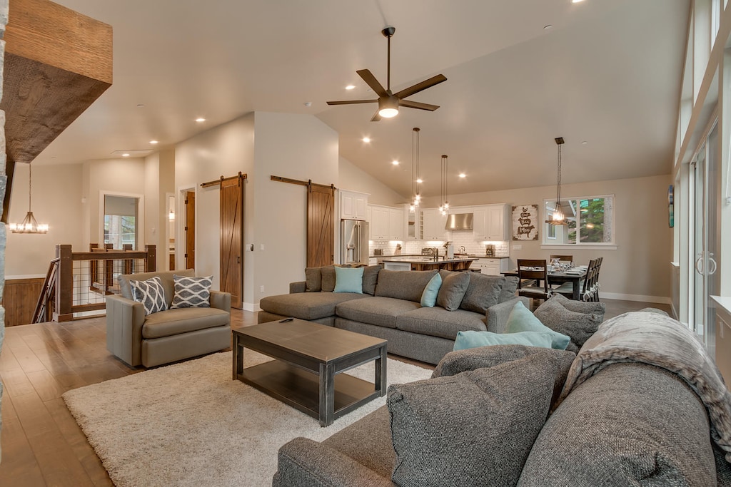 Living area adjacent to kitchen and dining