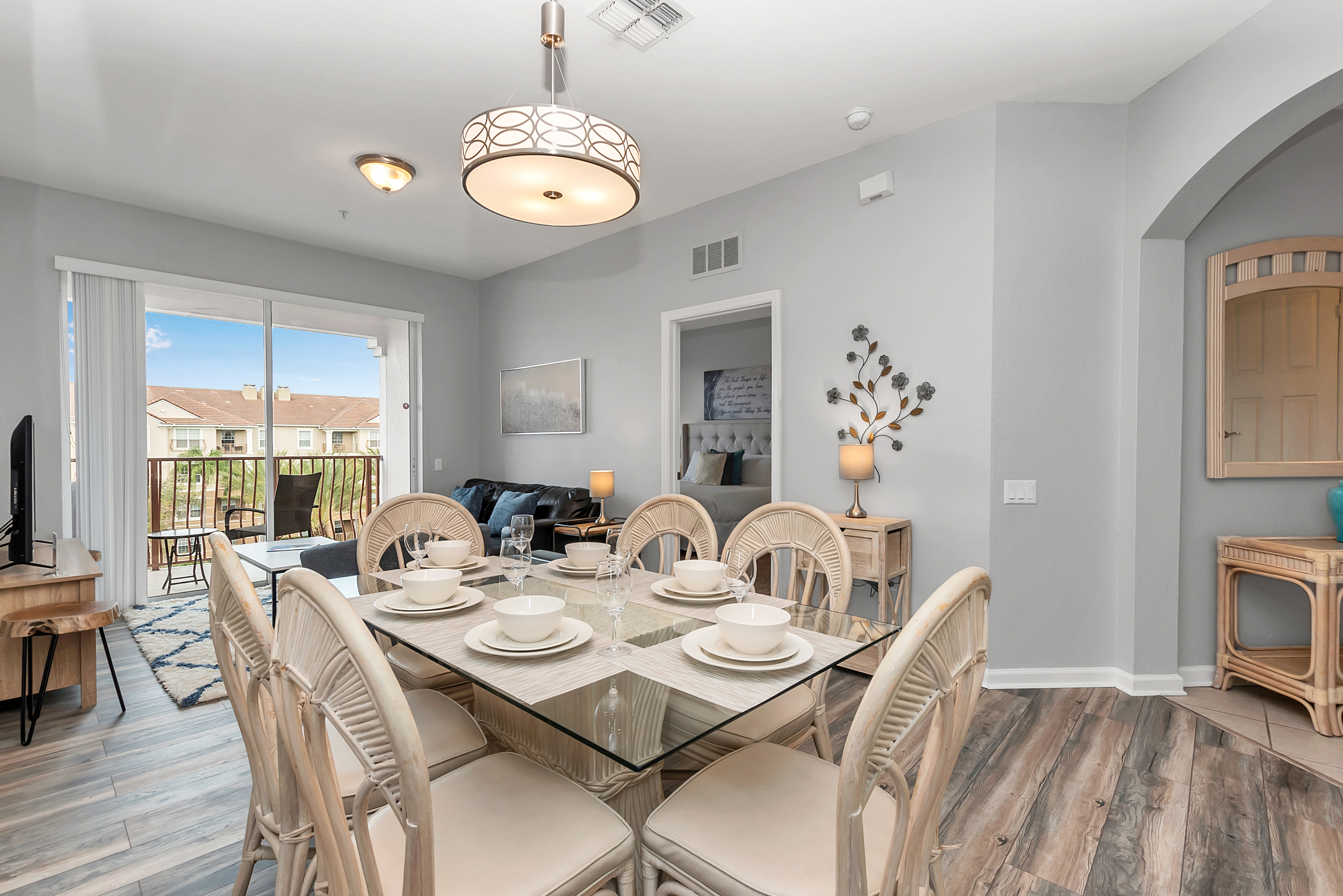 Sophisticated Gathering: Indulge in a sophisticated dining experience in our condo, where the dining area is adorned with stylish furnishings for an upscale stay