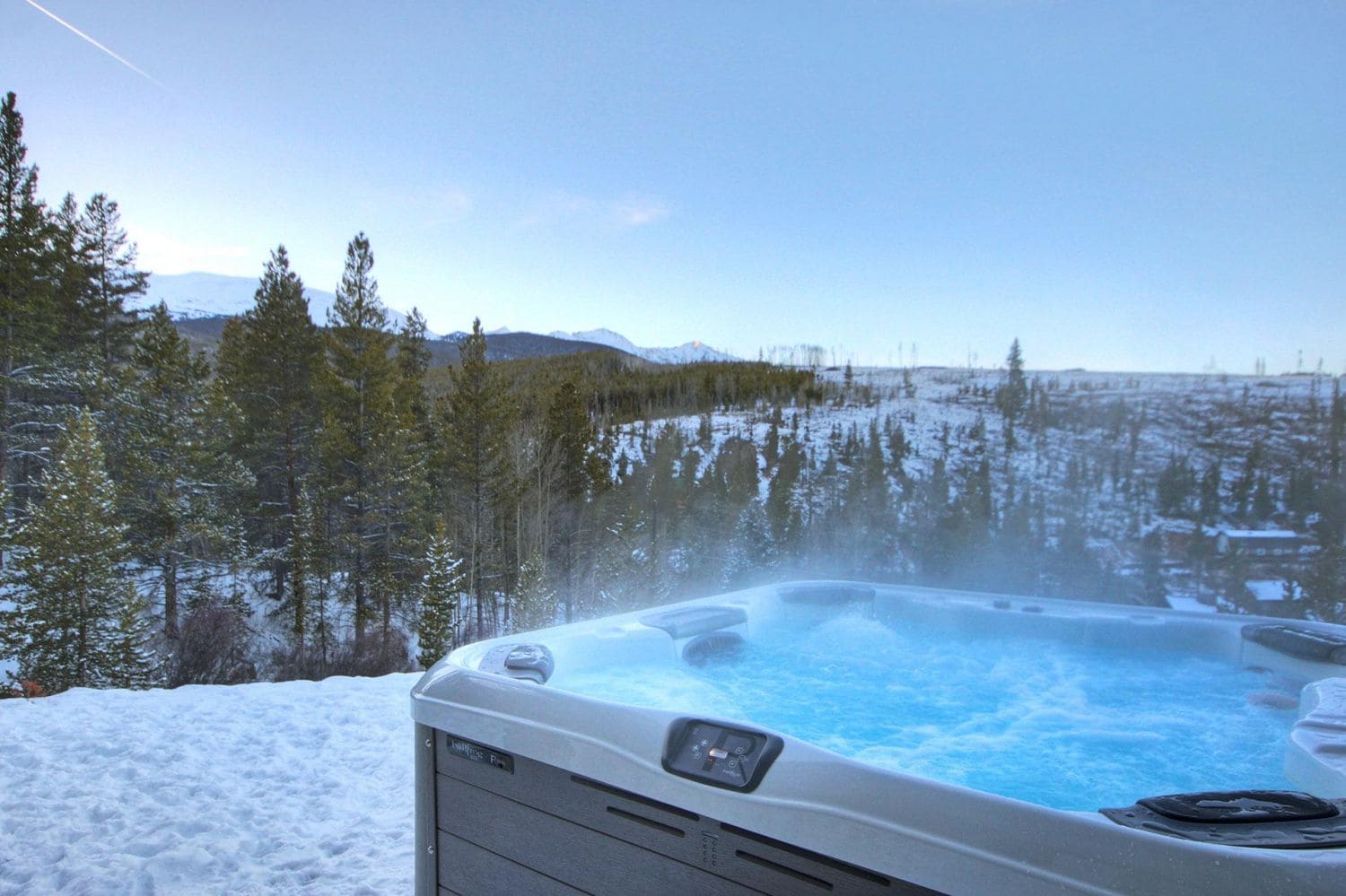 Soothe your achy muscles after a day on the slopes in your own private outdoor hot tub! - 