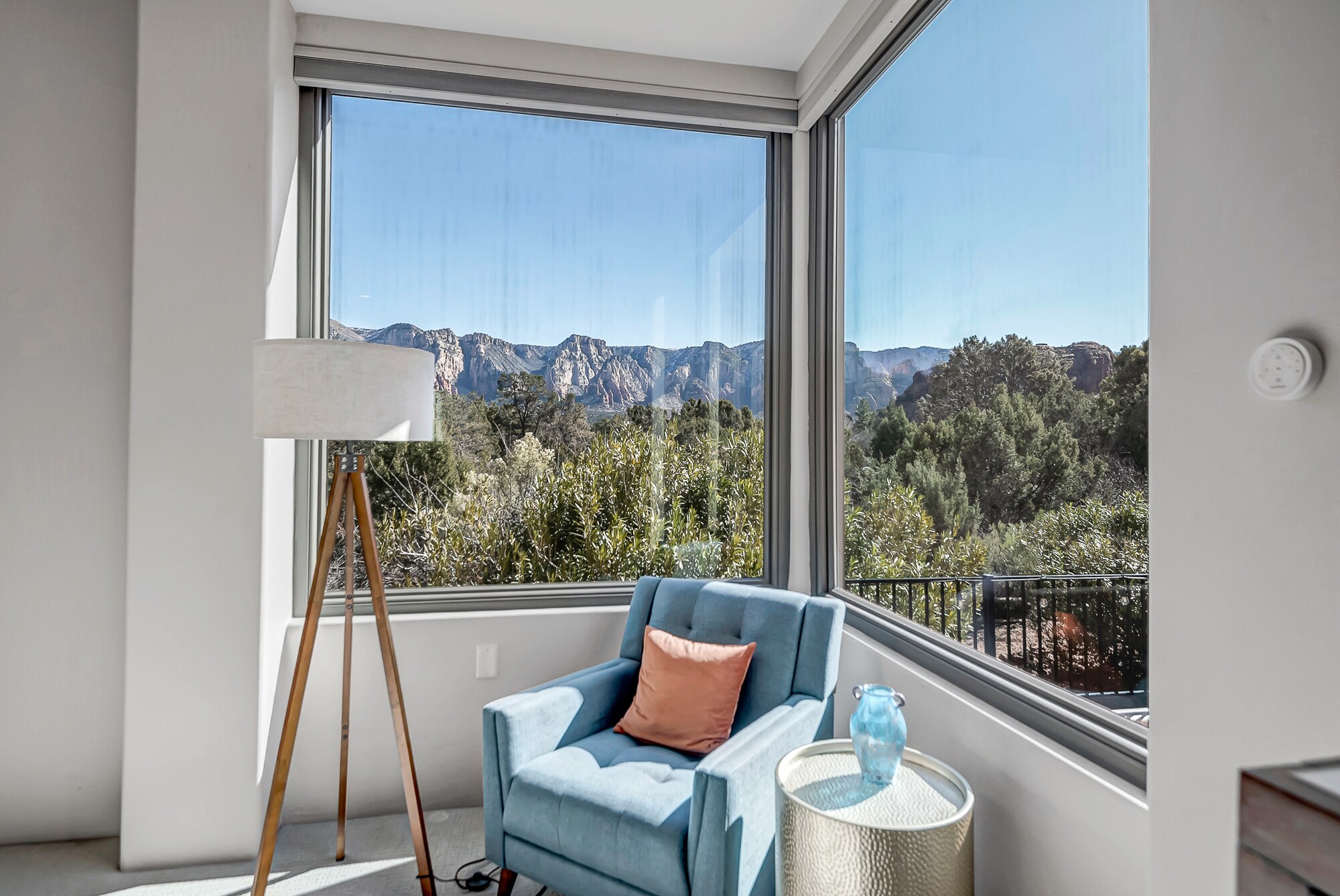 Large Windows with Natural Landscaping and Mountain Views