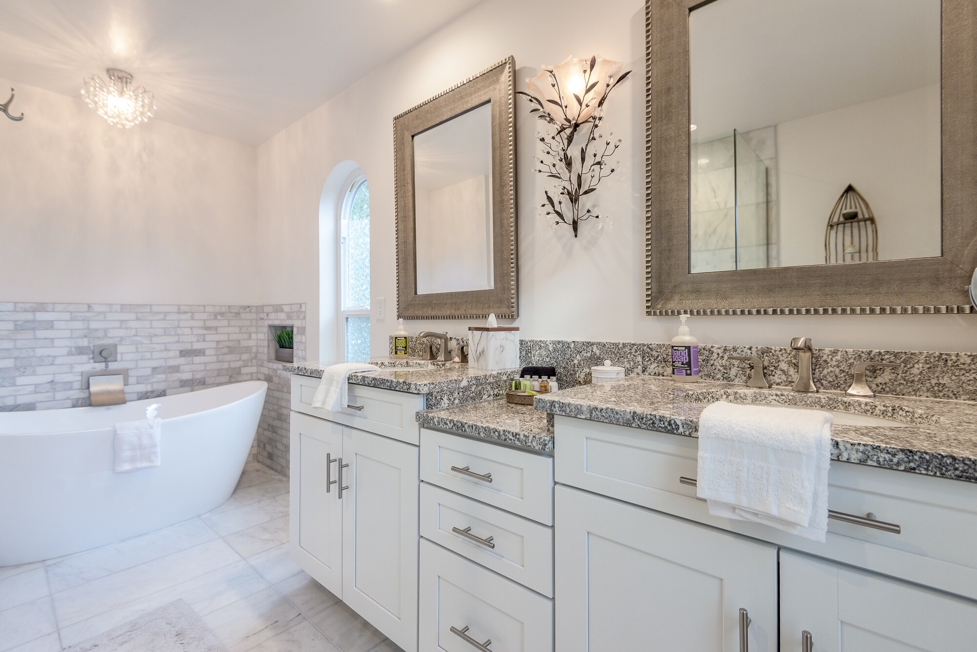 Granite Counters, Shaker Cabinets and Lots of Natural Light