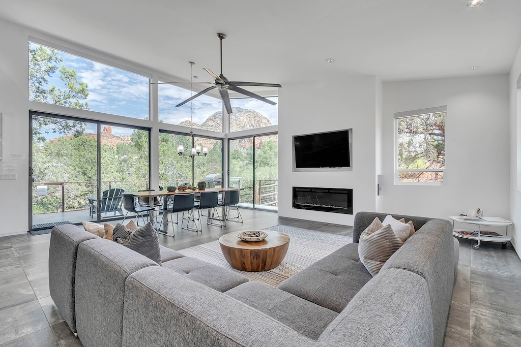 Contemporary Furnishings with TV and Gas Fireplace, Dining Area and Stunning Views