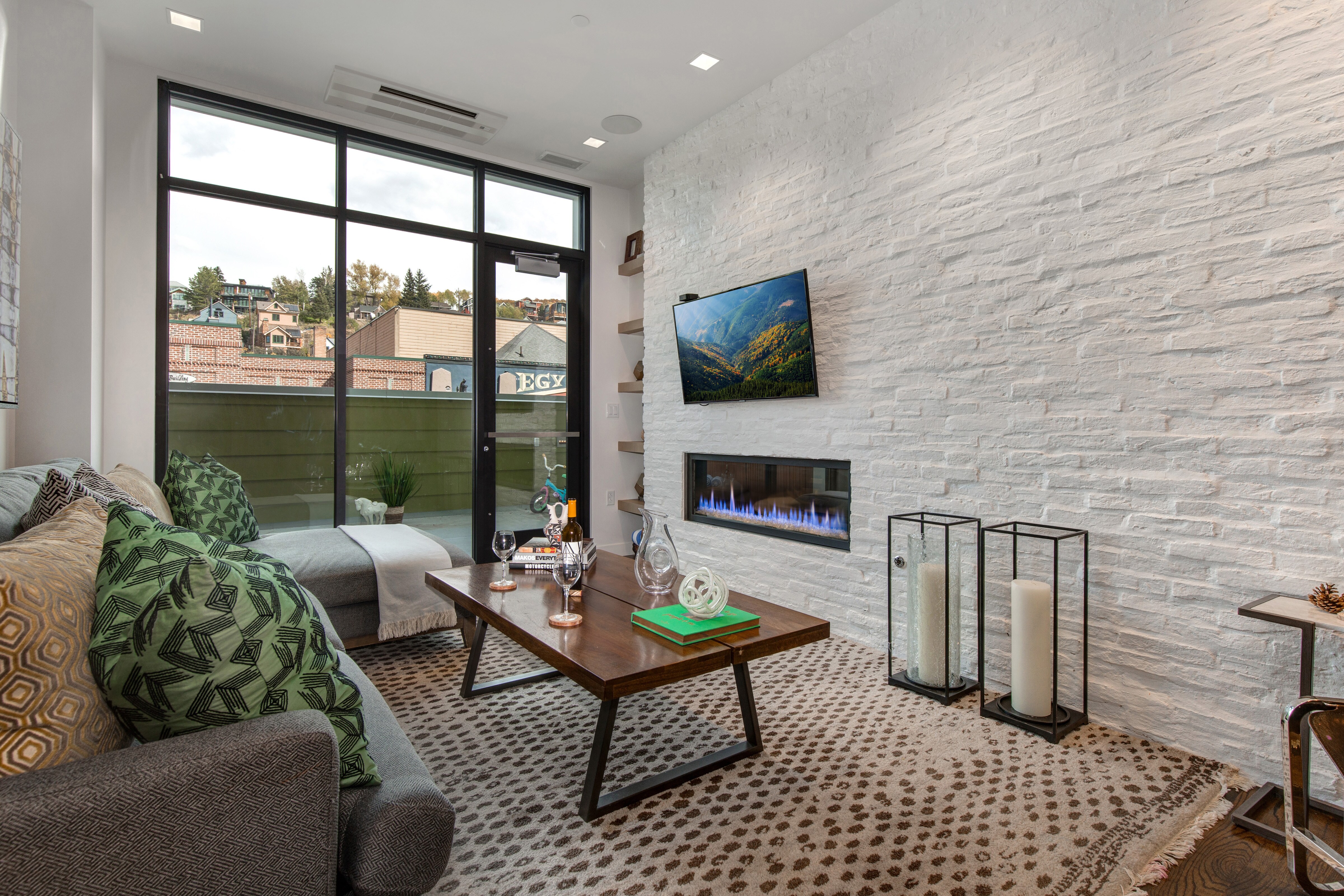 Cozy Living Room with a Gas Fireplace, Smart TV with Apple TV and Deck Access