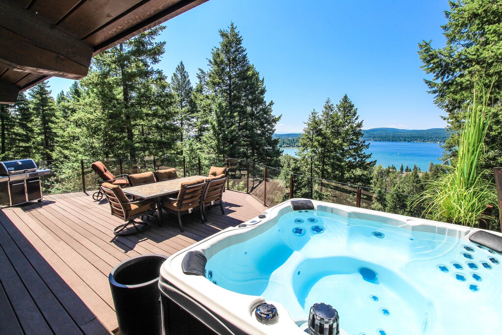 Spacious Deck with a Soothing Hot Tub, 8-seat outdoor table and Amazing Lake Views