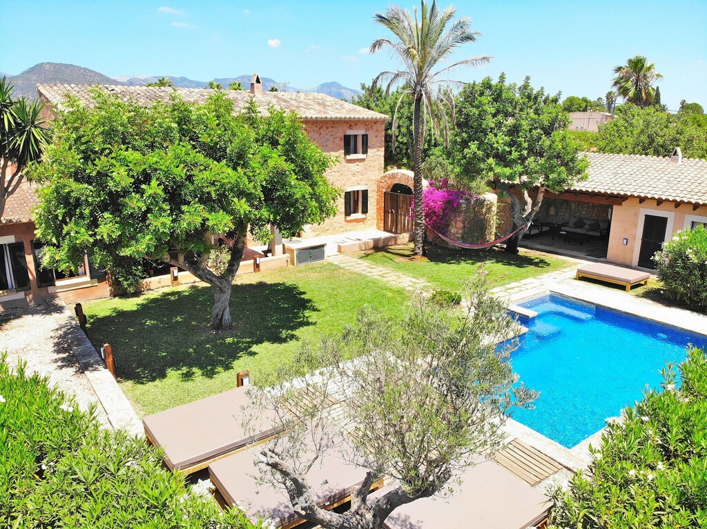 views of holiday home with swimming pool and lots of nature 