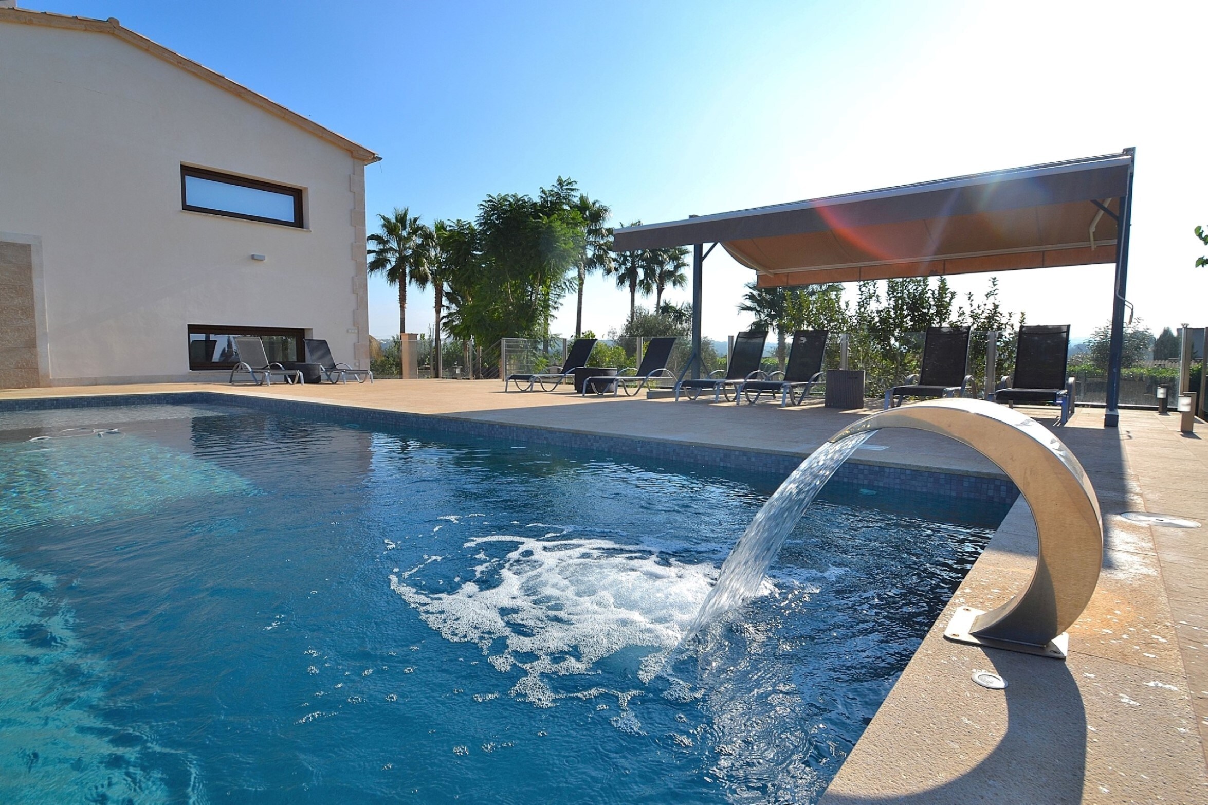 The villa is located in Muro Mallorca and has a large pool