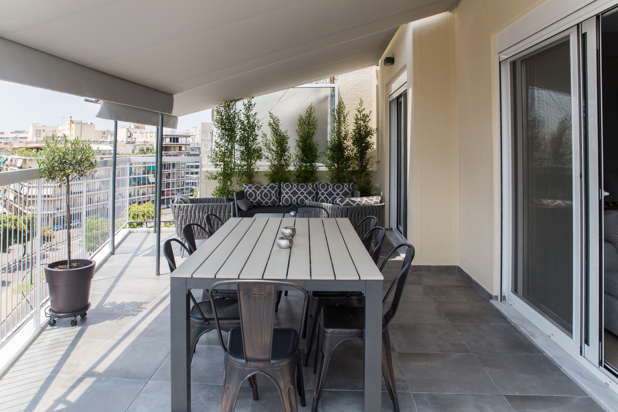 You will love your big private terrace on the top floor of the apartment, with a dining table and chairs and even a seating area. The big tends can be opened and protect you from the hot sunny days, but if you want you can even close them