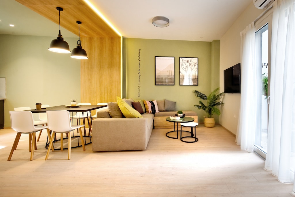 A fully renovated apartment, with two bedrooms, a living area with a big corner sofa bed and a dining area, a full kitchen and 2 luxurious bathrooms with a cabin shower.