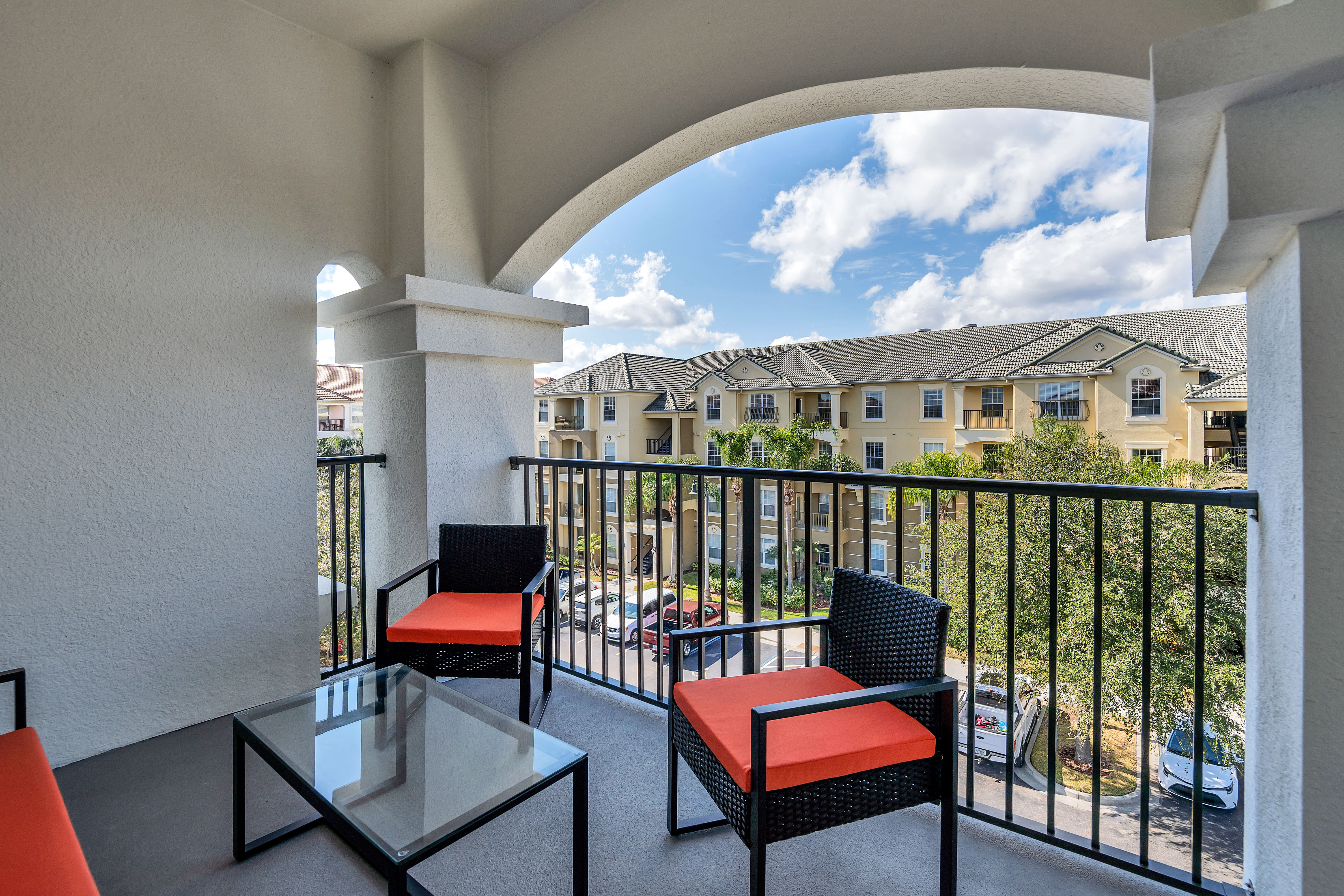 Step outside on our inviting private balcony of the condo in Orlando - Complete with comfortable seating – a tranquil retreat where you can soak in the beauty of the surroundings and enjoy moments of relaxation.