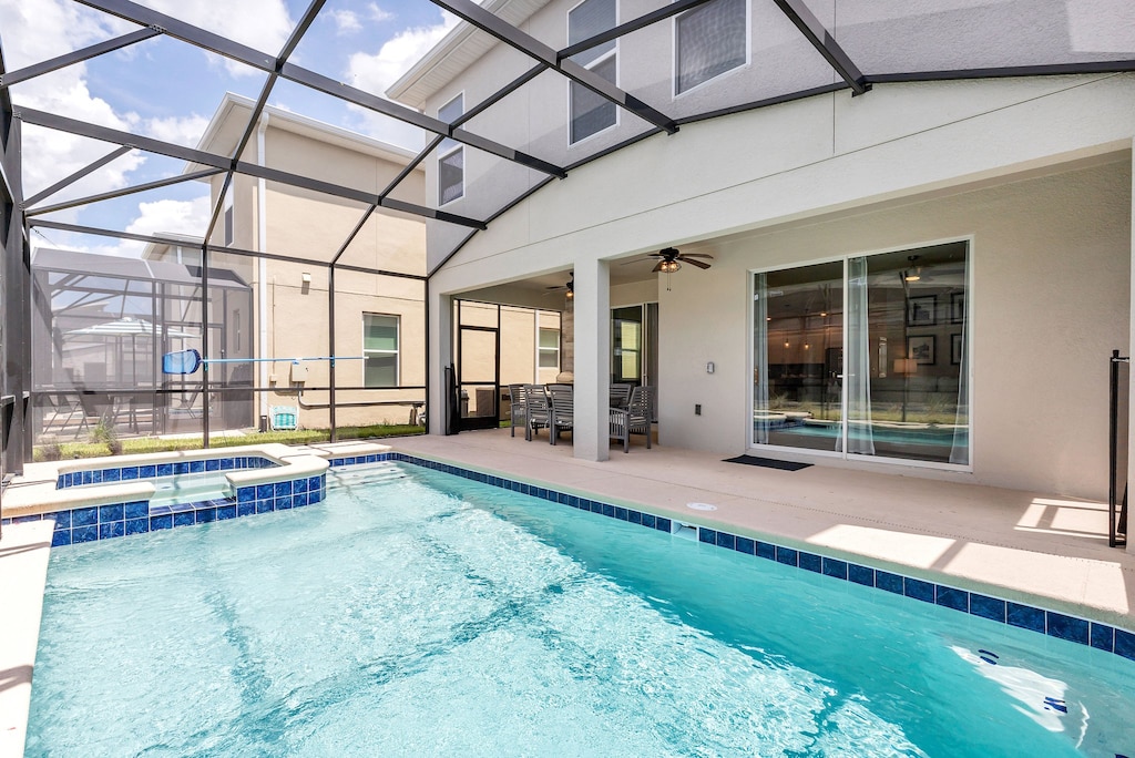 Stunning private pool of the home in Kissimmee Florida - Dive into a refreshing poolside escape - Enjoy leisurely moments in our inviting pool area - Lounge in tranquility by the sparkling waters
