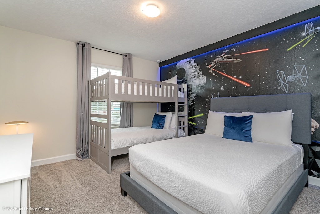 Star Wars Themed Bedroom of the Townhouse in Kissimmee Florida - Offering a Double bed and a bunker bed - Thoughtfully designed interiors for comfort - Bedroom with a cozy ambiance, blending comfort and aesthetics