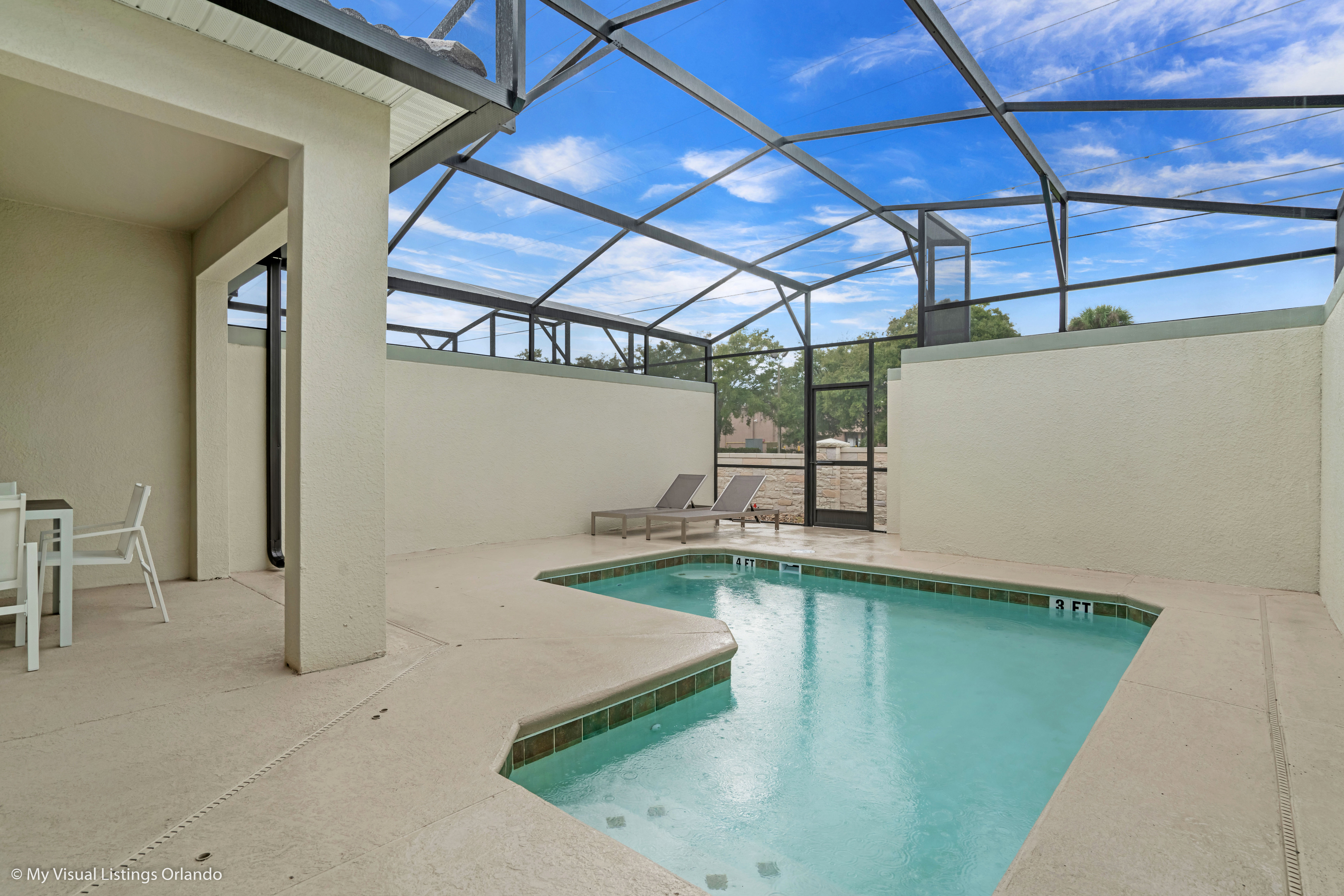 - Stunning Private Pool of the Townhouse in Kissimmee Florida - Inviting pool area for a perfect getaway - Discover bliss by the pool in serene setting - Comfortable lounge chairs for ultimate relaxation