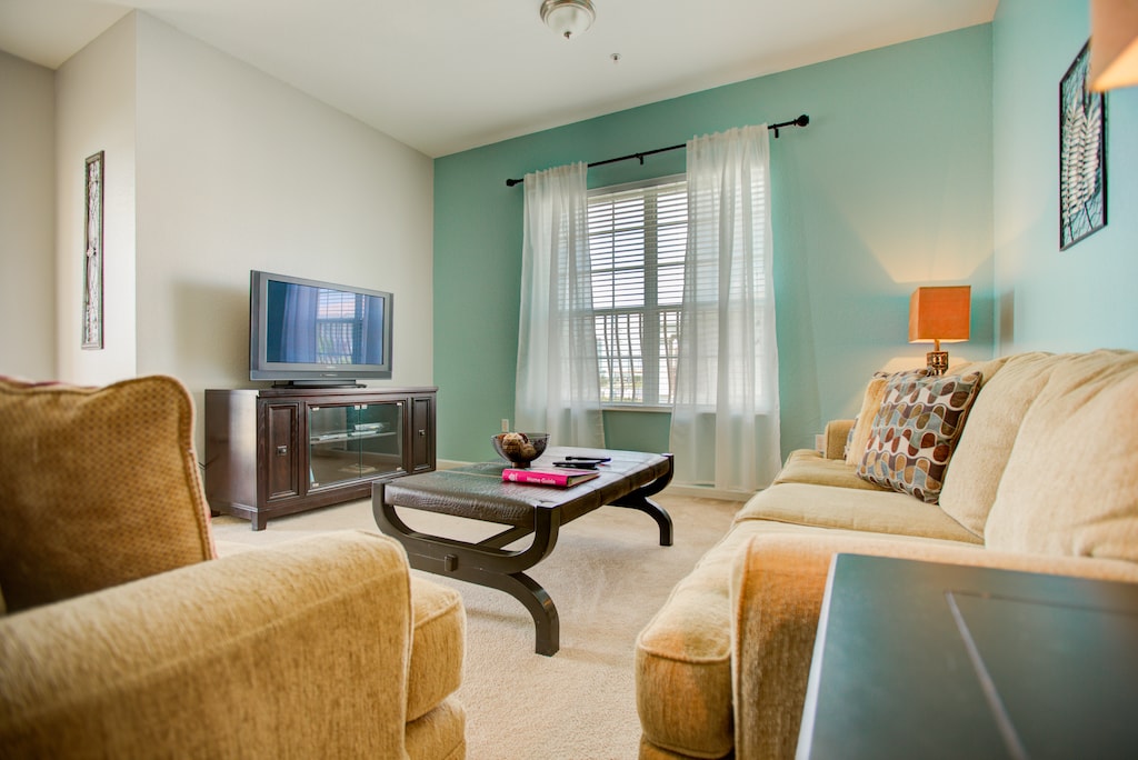 Entertainment meets comfort: our living area is your haven for leisure and relaxation.