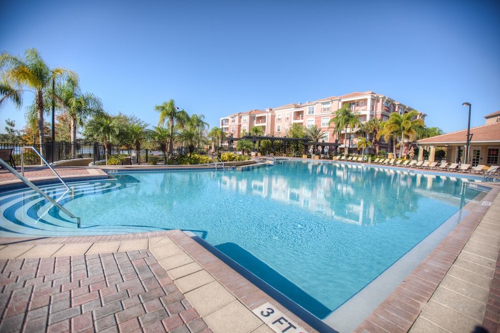 The pool where shimmering waters beckon guests to unwind and indulge in ultimate relaxation.