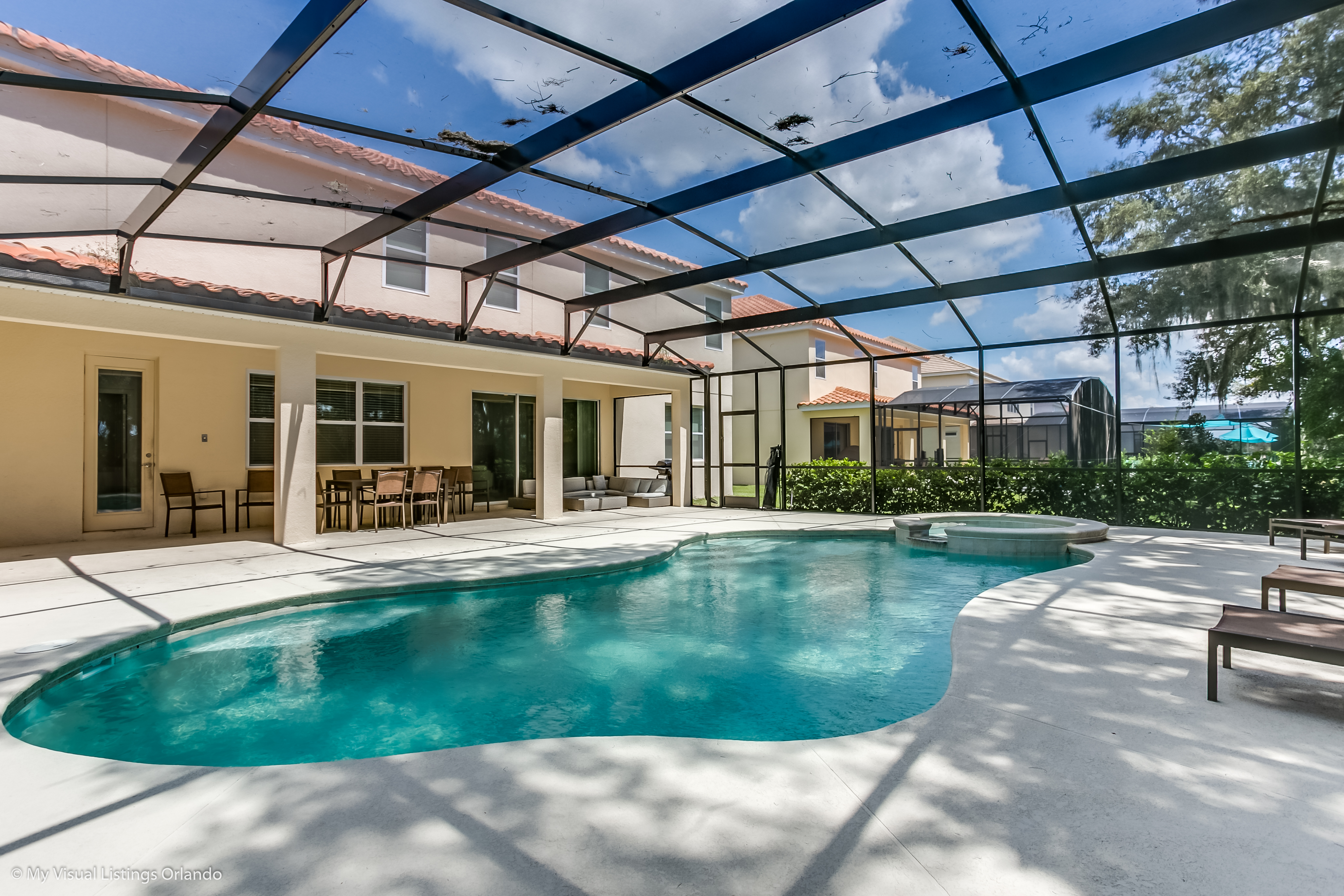 Lavish Private Pool Area of the Villa in Florida - Enjoy leisurely moments in our inviting pool area - Comfortable Beach Chairs - Crystal Clear Water