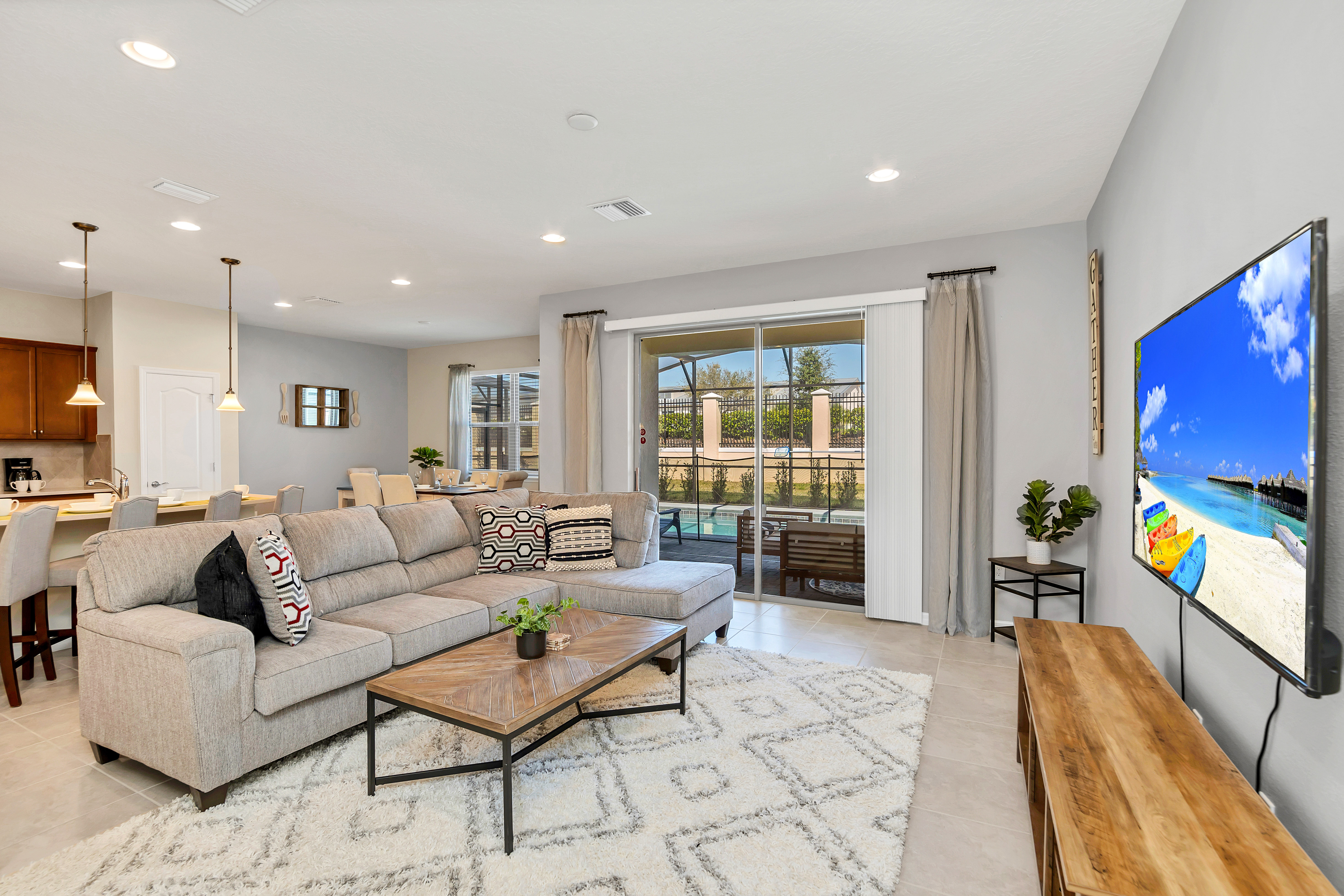 Resplendent Living Area of the Apartment in Reunion Florida - Smart TV and Netflix - Beautiful living room with an open layout, creating a sense of spaciousness - Cozy seating area conducive to relaxation and socializing