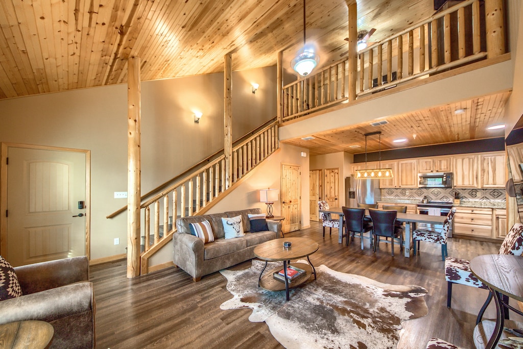 Open living area with Cable, smart TV and sleeper sofa.