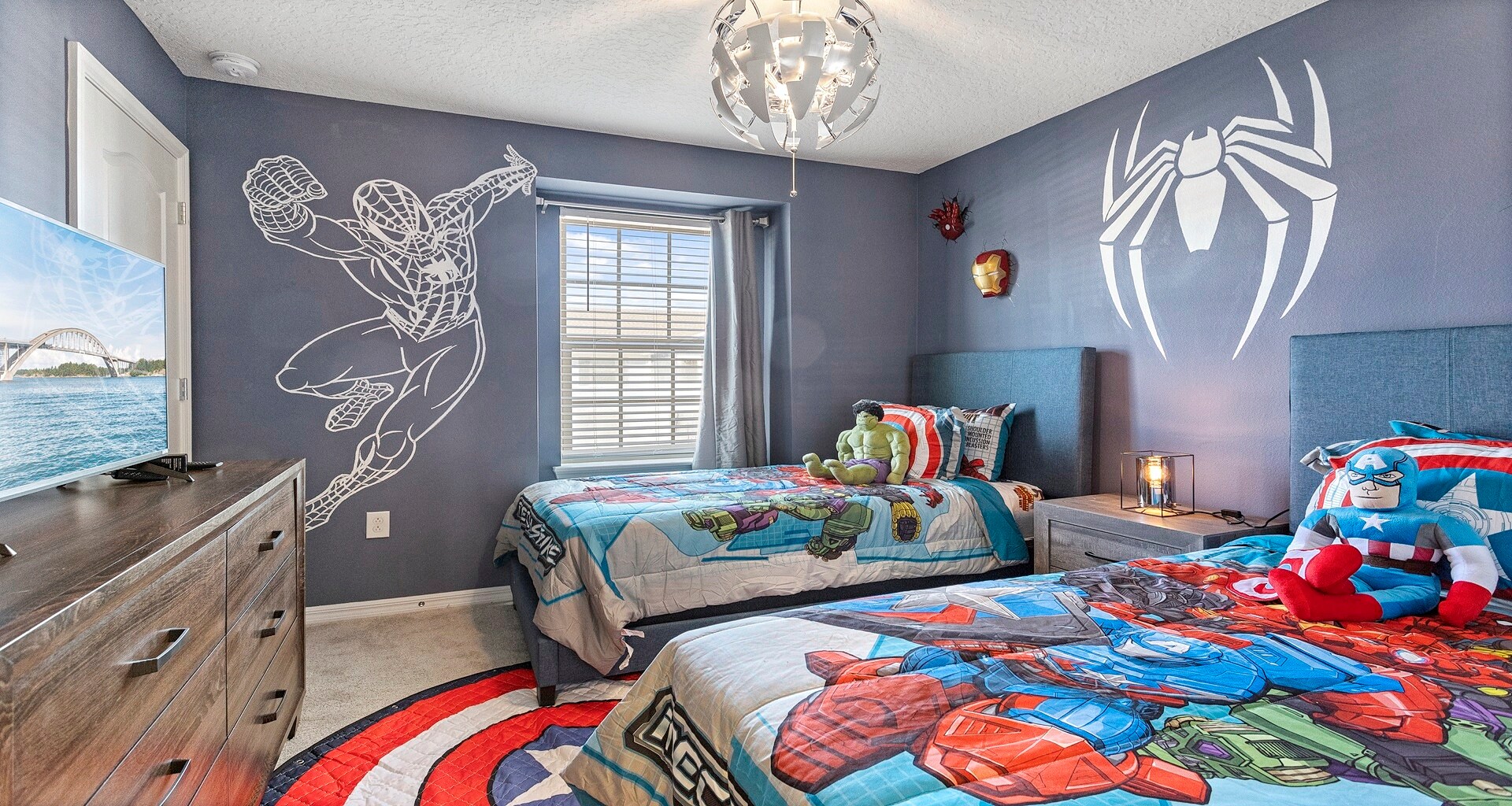 Kids will love the upstairs bedroom with a cool Spiderman theme