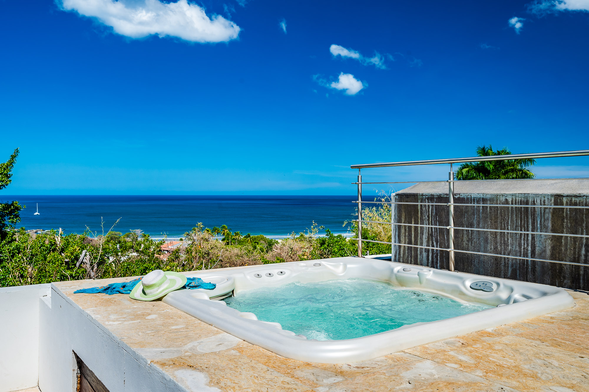 Relax in the jaccuzi as the sun sets over the horizon