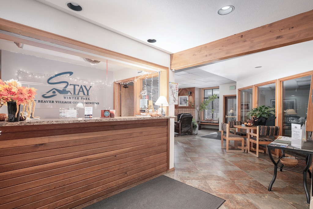 Step into this welcoming lobby with warm wood accents and comfortable seating where your mountain getaway begins.