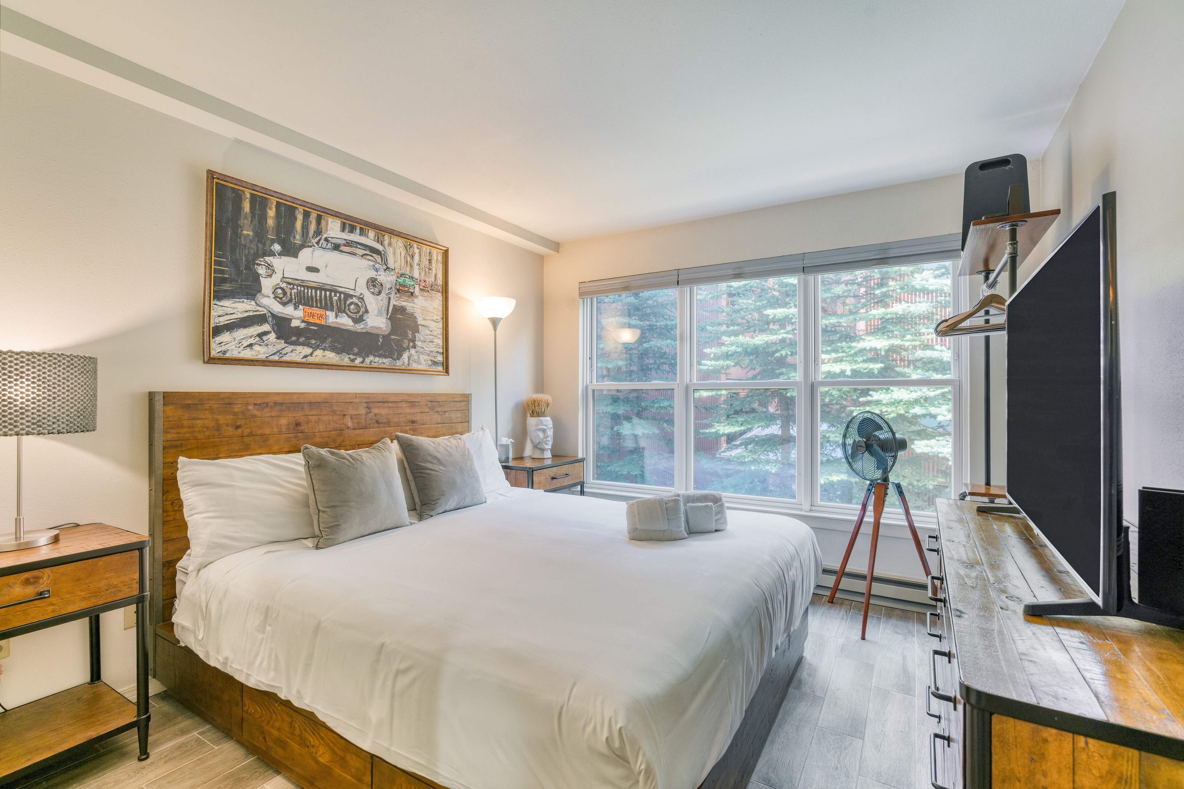 Bedroom features a California king bed.