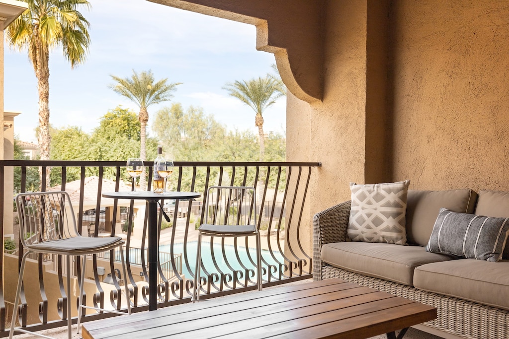 Private balcony overlooking the pool.