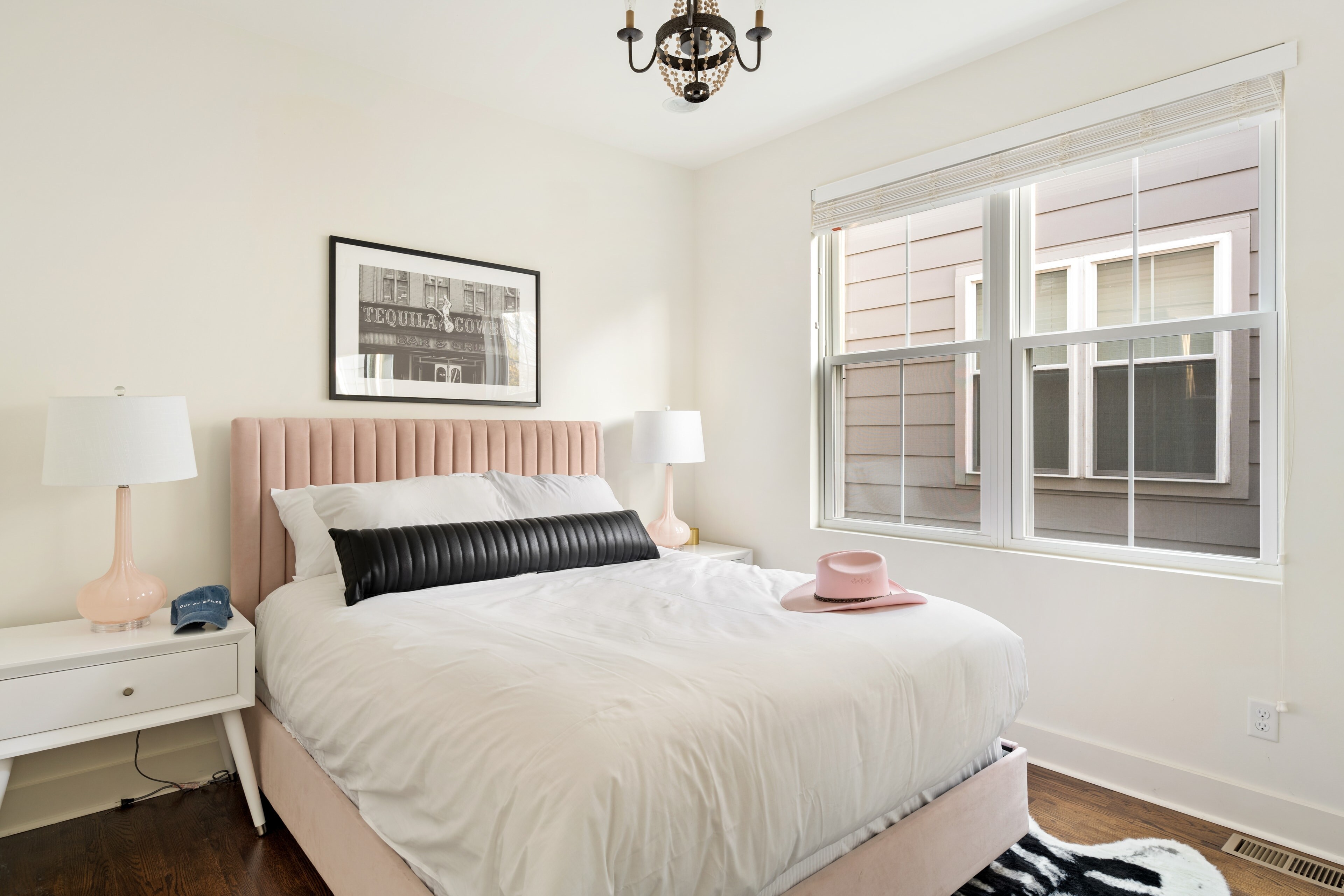 Primary bedroom features a queen bed.