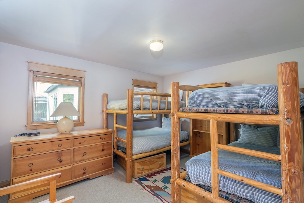 Bedroom 2 features two bunk beds.