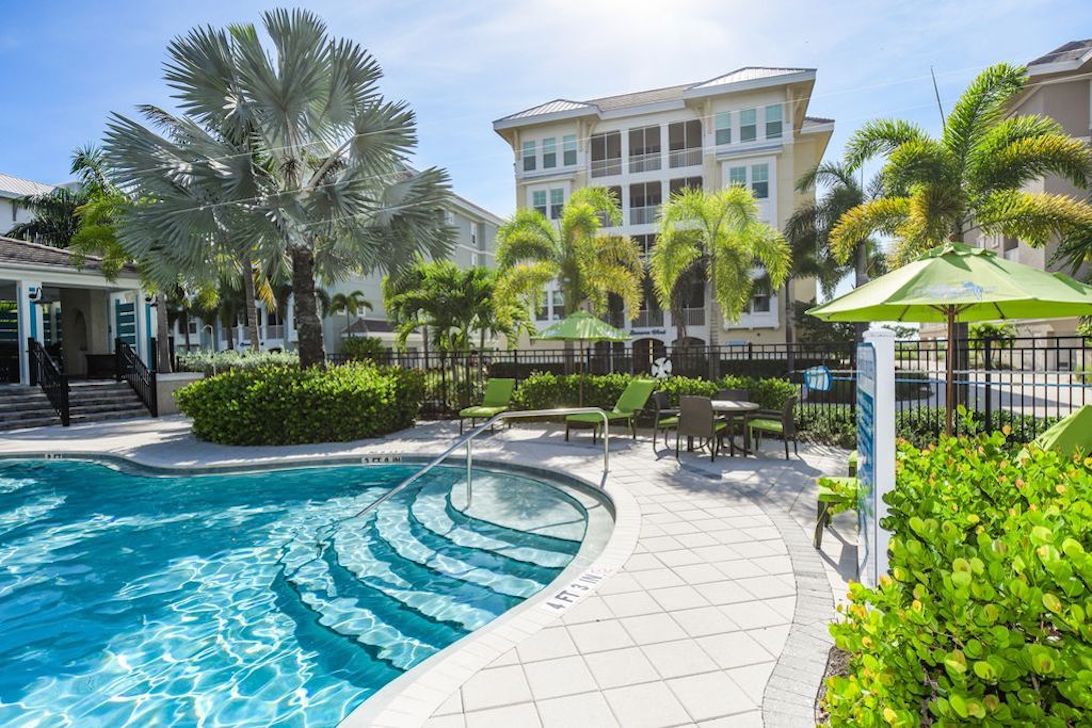 Property Image 1 - Sunset Margarita - Luxury Condo, Lanai, Pool, Beach Gear, Bikes, Dogs OK! 5 Mins to Gulf Beaches!