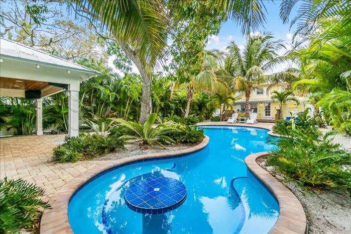 Property Image 1 - Coconut Lagoon - Lovely Historic Renovated Cottage w/Huge Heated Pool & Backyard Oasis/Cabana/Bar
