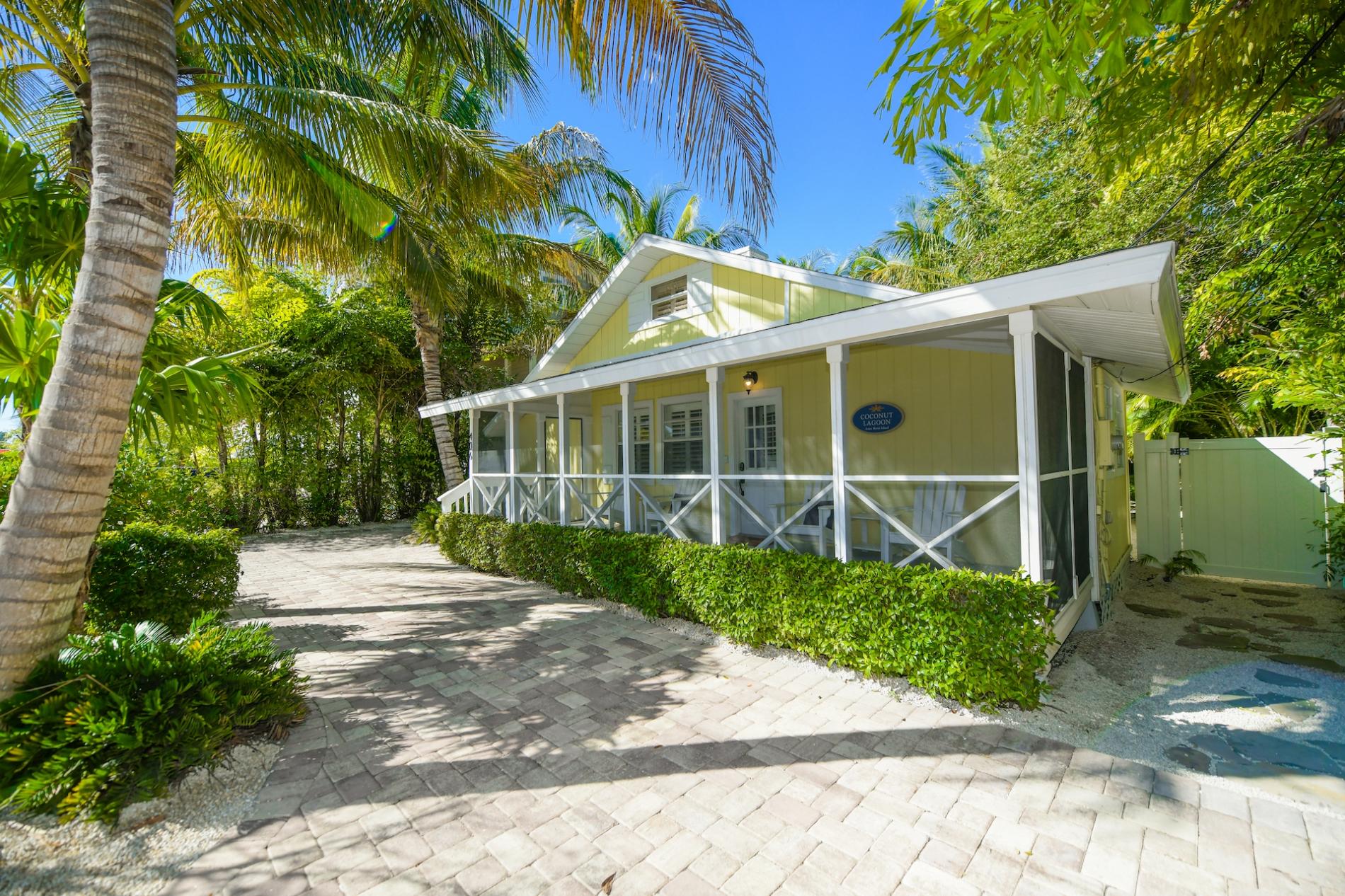 Property Image 2 - Coconut Lagoon - Lovely Historic Renovated Cottage w/Huge Heated Pool & Backyard Oasis/Cabana/Bar