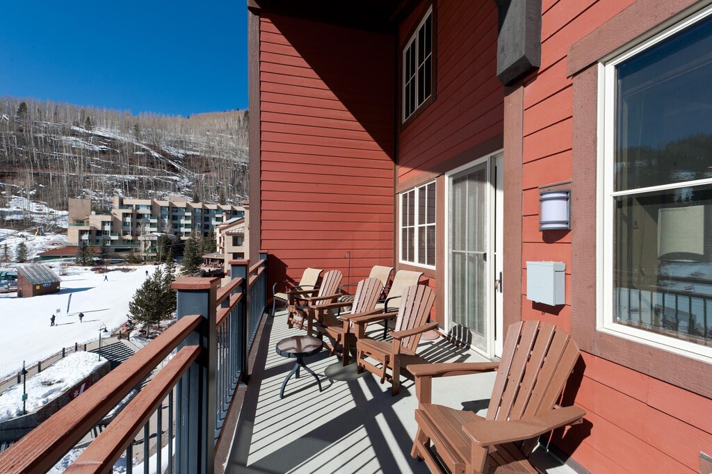 Deck with plenty of outdoor seating (and the private hot tub of course)