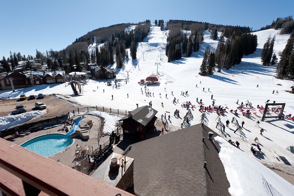 Views from the deck of the main base area and the heated pool with slide 