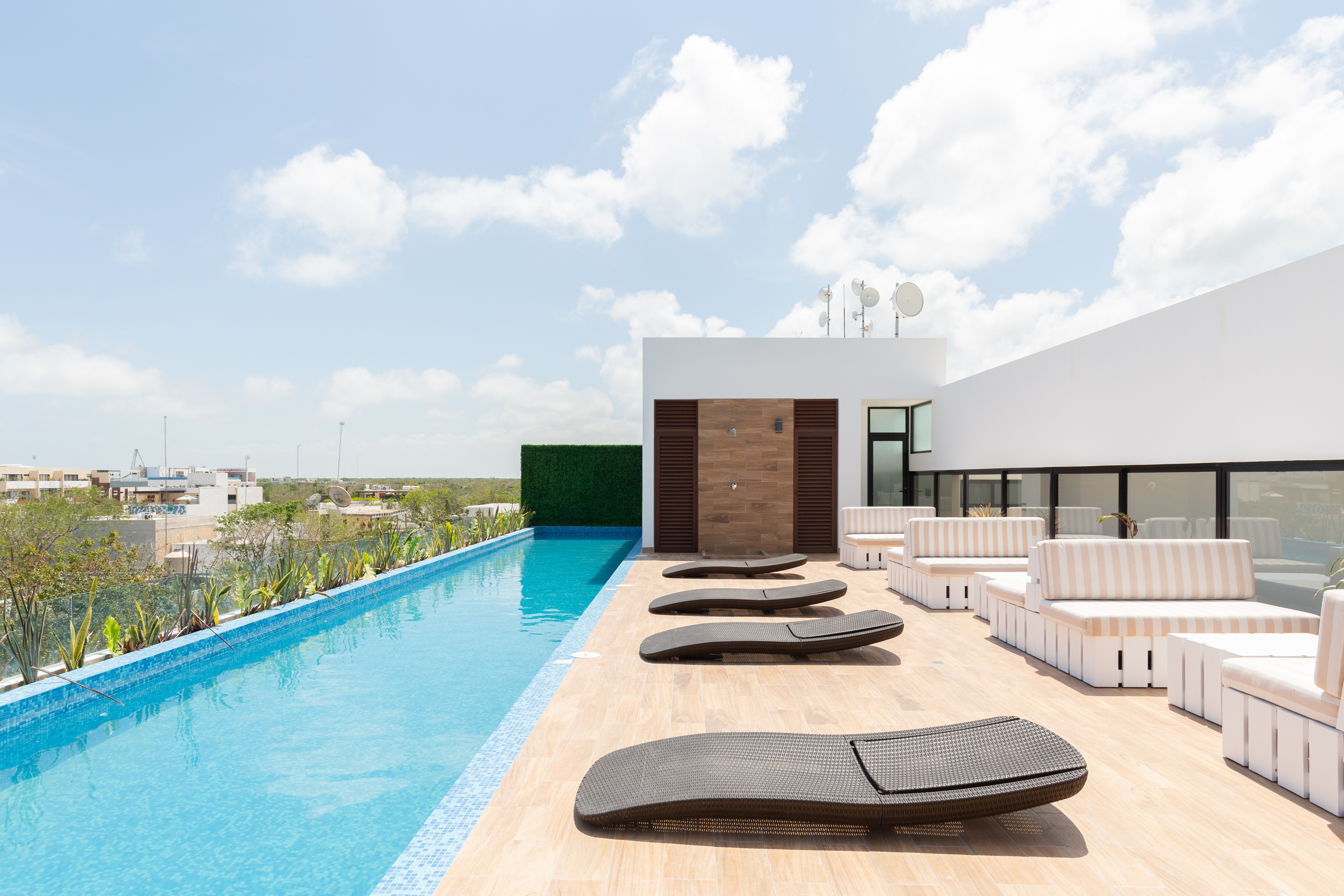 Property Image 1 - Elevated Bliss: Luxe Aldea Zama Hideaway with Rooftop Infinity Pool and Sun Loungers